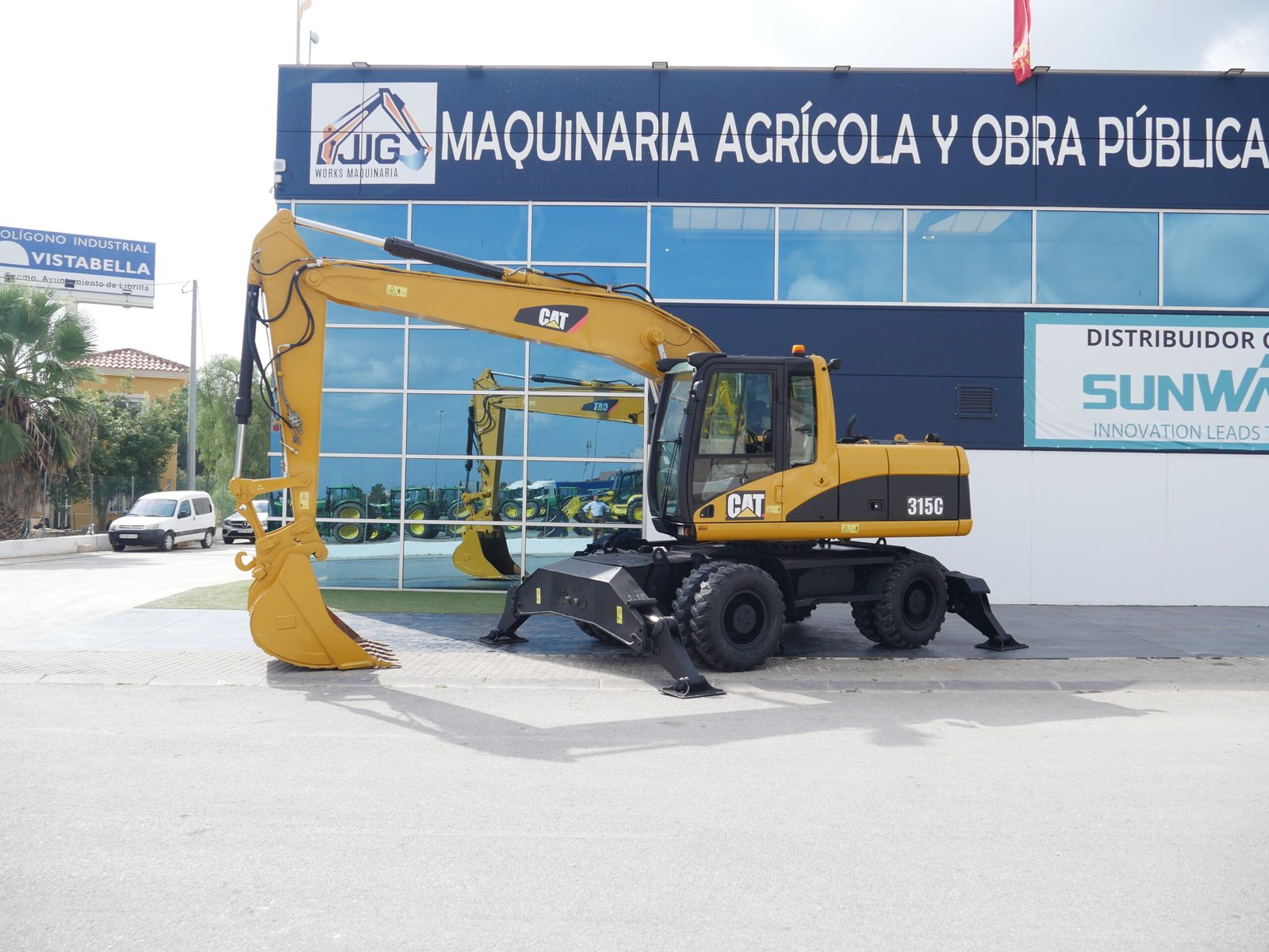 Excavadora de ruedas Caterpillar M315C de 2007 con aire acondicionado, 4 patas, enganche rápido y 2 líneas hidráulicas