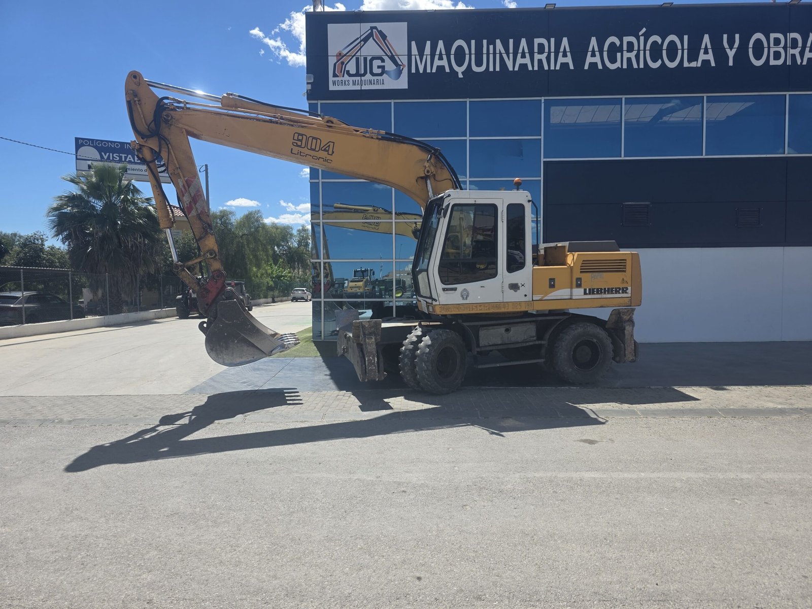 Ruedas excavadora Liebherr A 904 Cabina panorámica Liebherr A 904 Liebherr A 904 en movimiento urbano Excavadora de ruedas Liebherr en venta