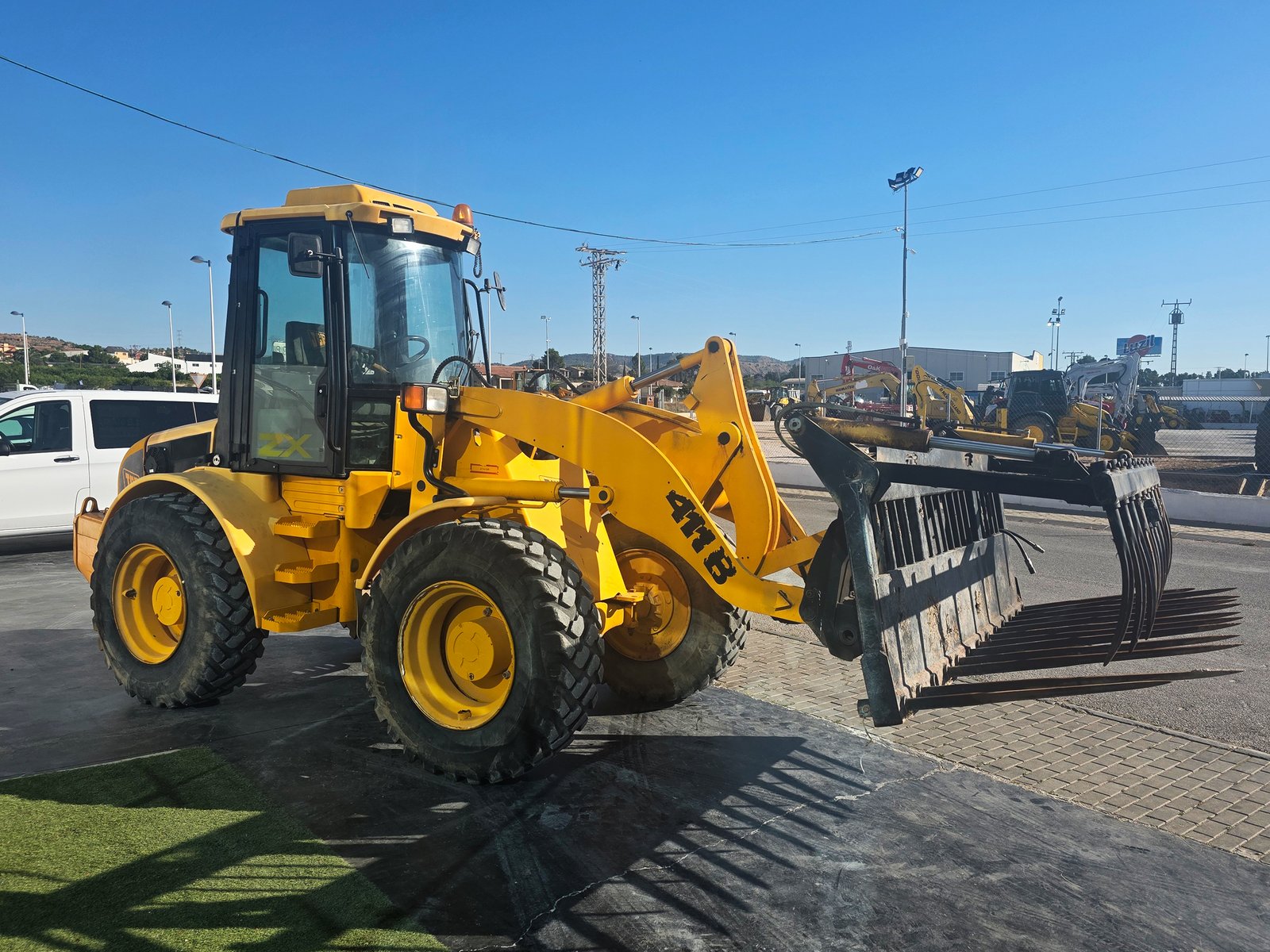 Cabina JCB 411B con aire acondicionado Pala cargadora JCB trabajando JCB 411B cargando áridos