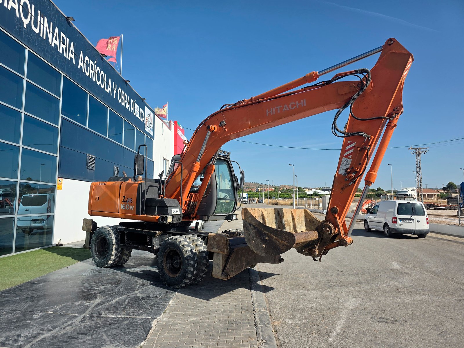 Hitachi ZX160W excavando zanja Sistema hidráulico Hitachi ZX160W Excavadora urbana Hitachi ZX160W Hitachi ZX160W lista para trabajar Brazo excavador Hitachi ZX160W