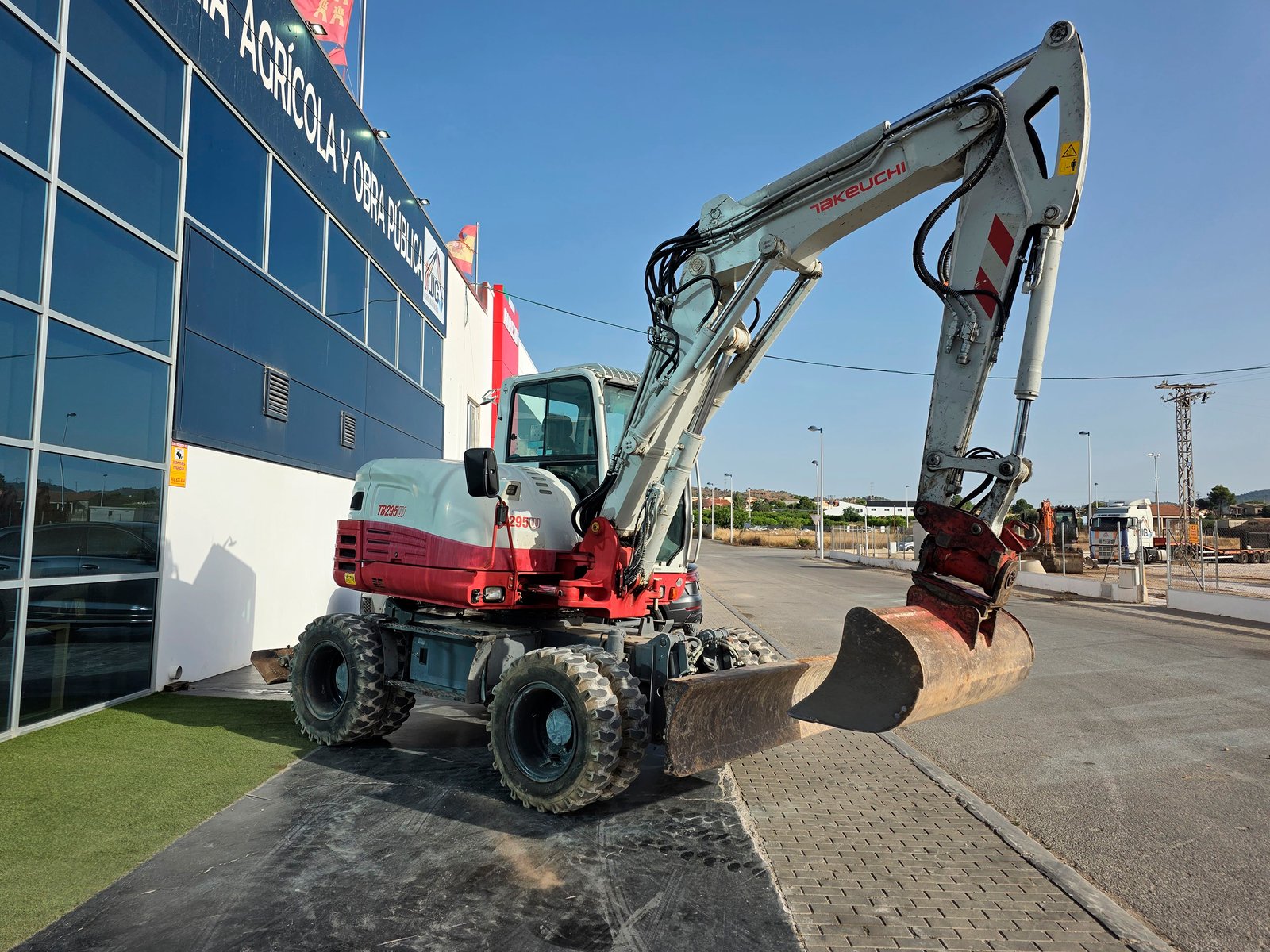 Excavadora de ruedas 10 toneladas Takeuchi Takeuchi TB295W lista para trabajar Excavadora de ruedas usada en venta Brazo excavador Takeuchi TB295W Takeuchi TB295W maquinaria obra pública Excavadora Takeuchi TB295W en JJG Works
